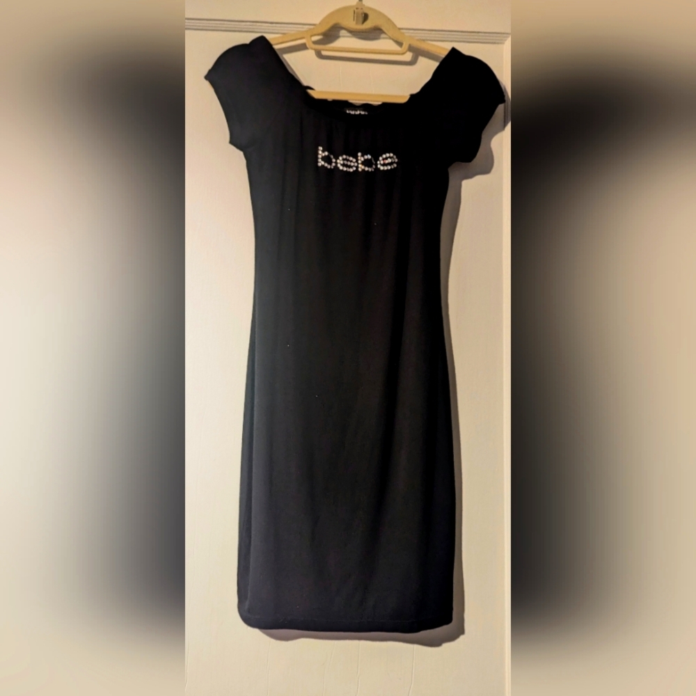 NWT, BEBE Black Stretch Off The Shoulder Bodycon Dress Rhinestone Logo. Sz S